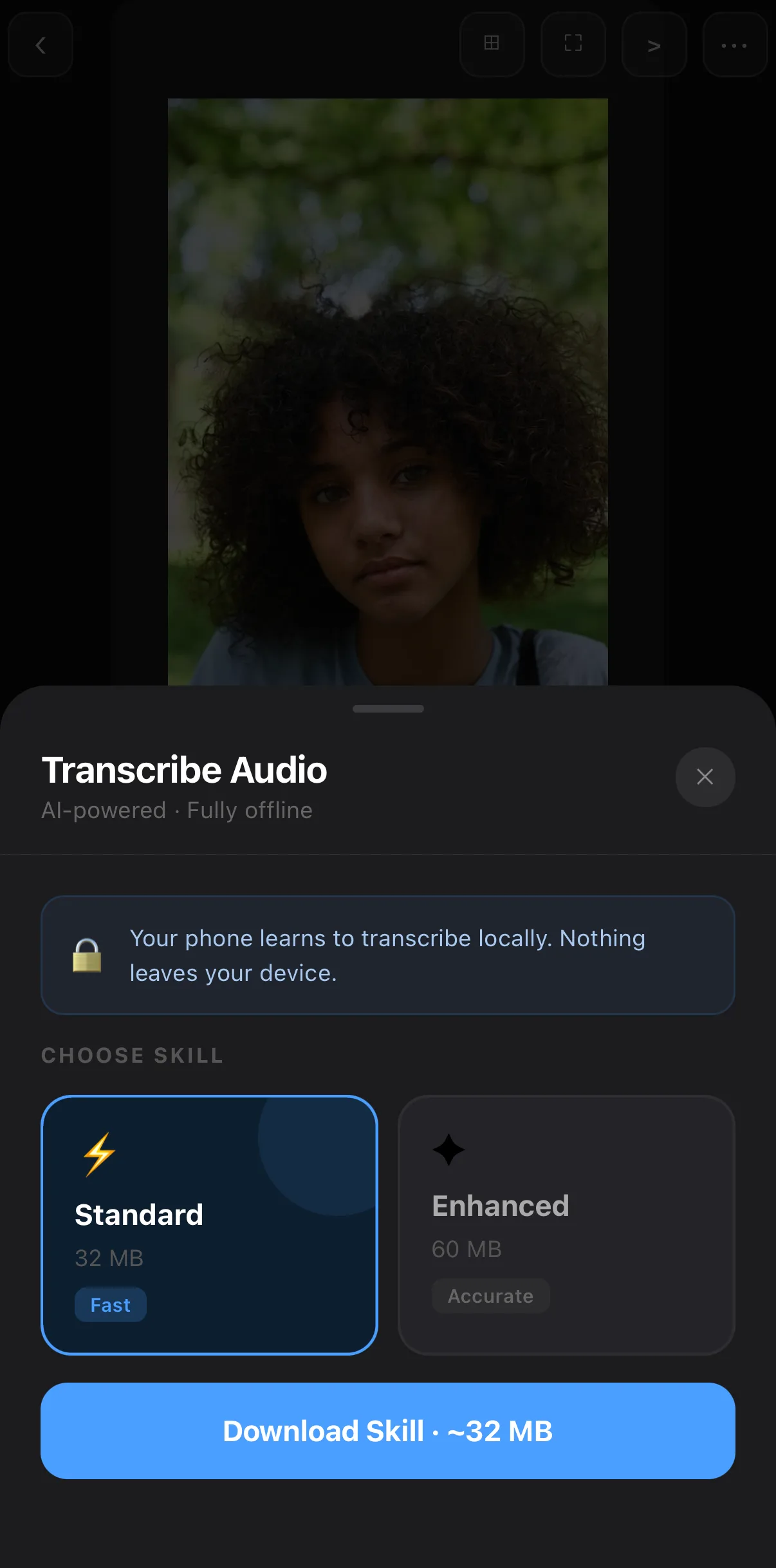 The Transcribe Audio sheet: AI-powered · Fully offline, a note that nothing leaves your device, Choose Skill tiles Standard 32 MB Fast and Enhanced 60 MB Accurate, and a Download Skill ~32 MB button.