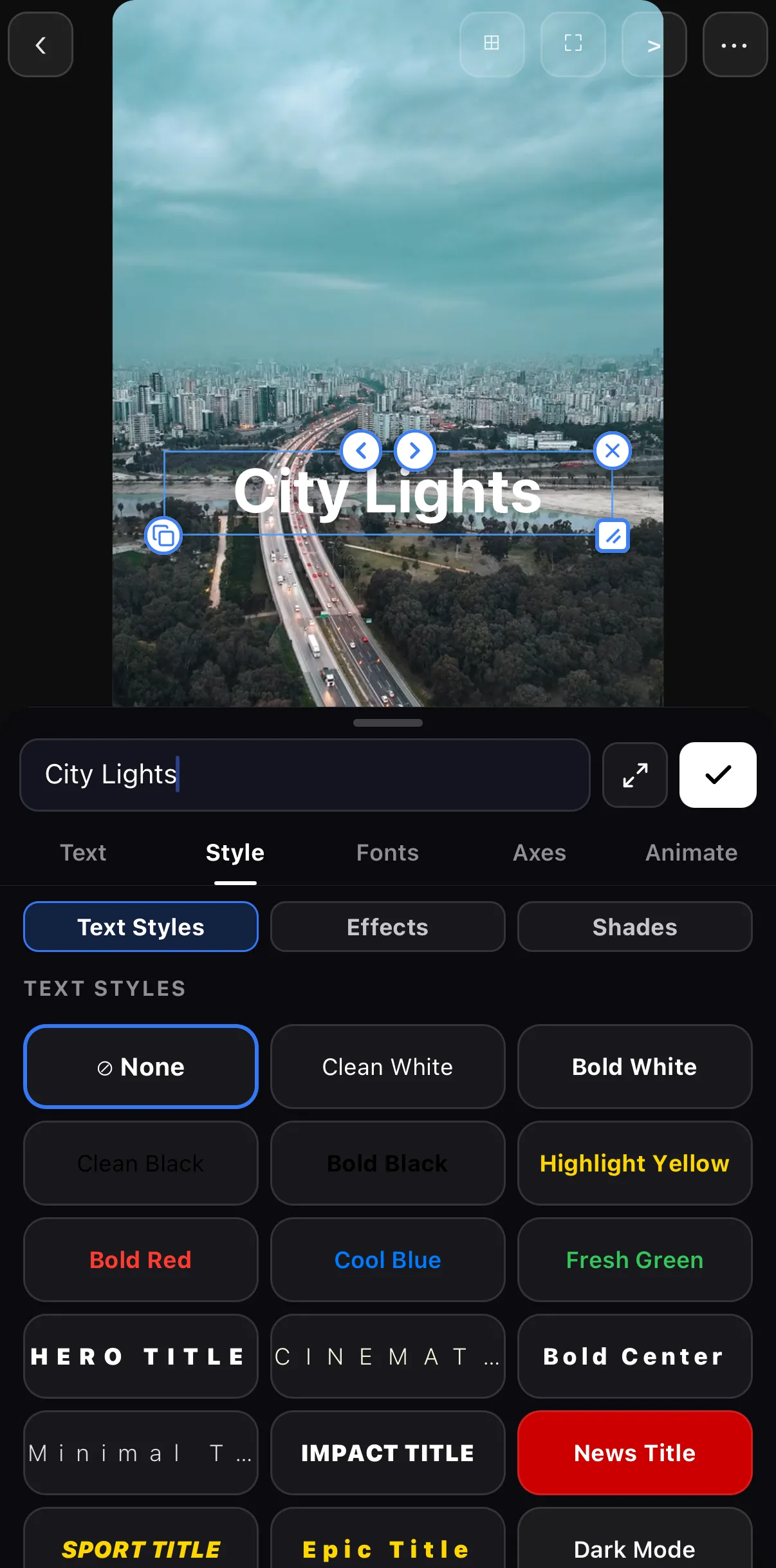 The ExpoCut text tray under the live canvas, on the Style tab, with the City Lights headline in the field and the Text Styles grid below