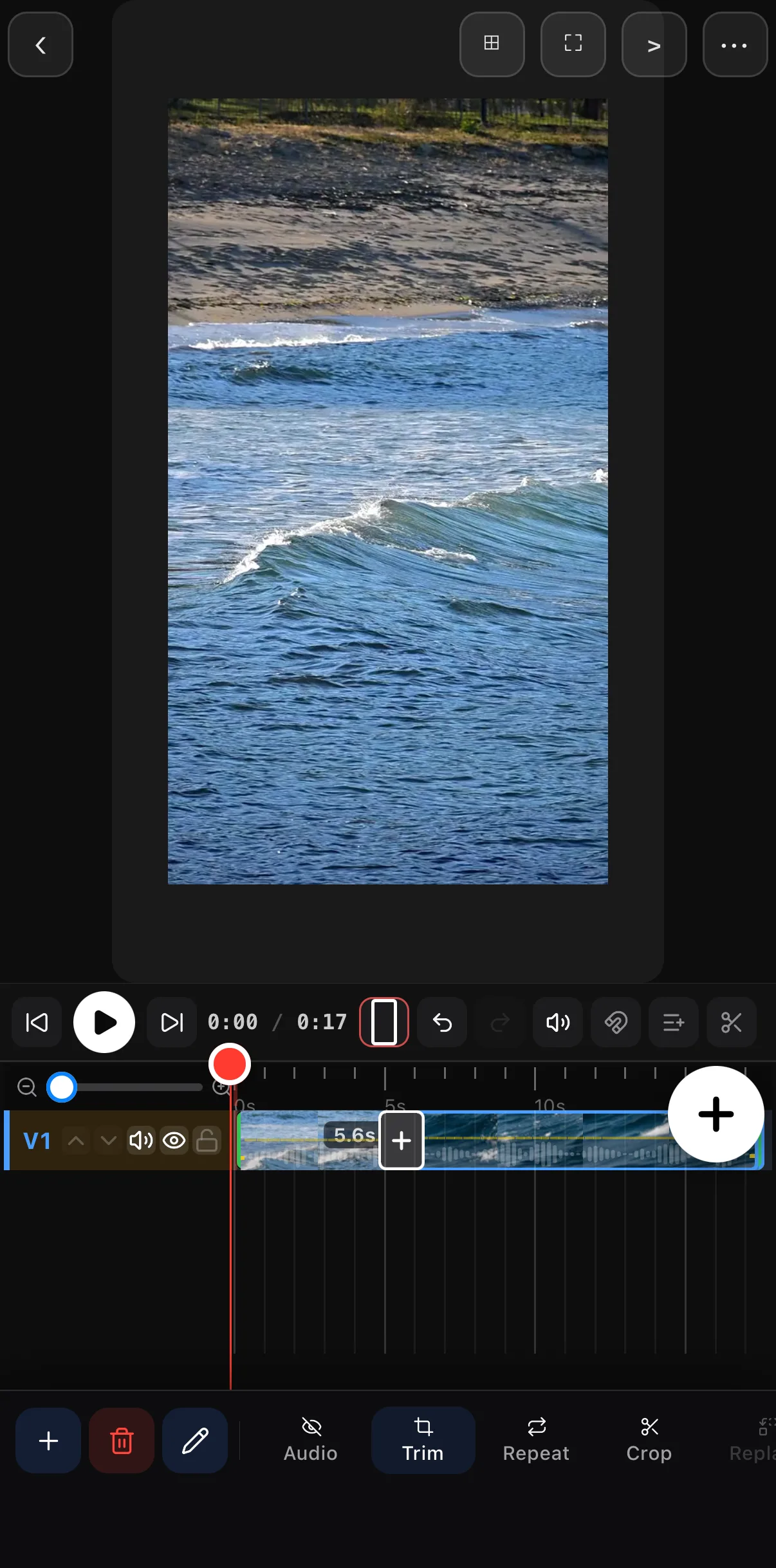 Two clips butt-joined on the V1 row of the timeline with the + joiner button on the cut between them
