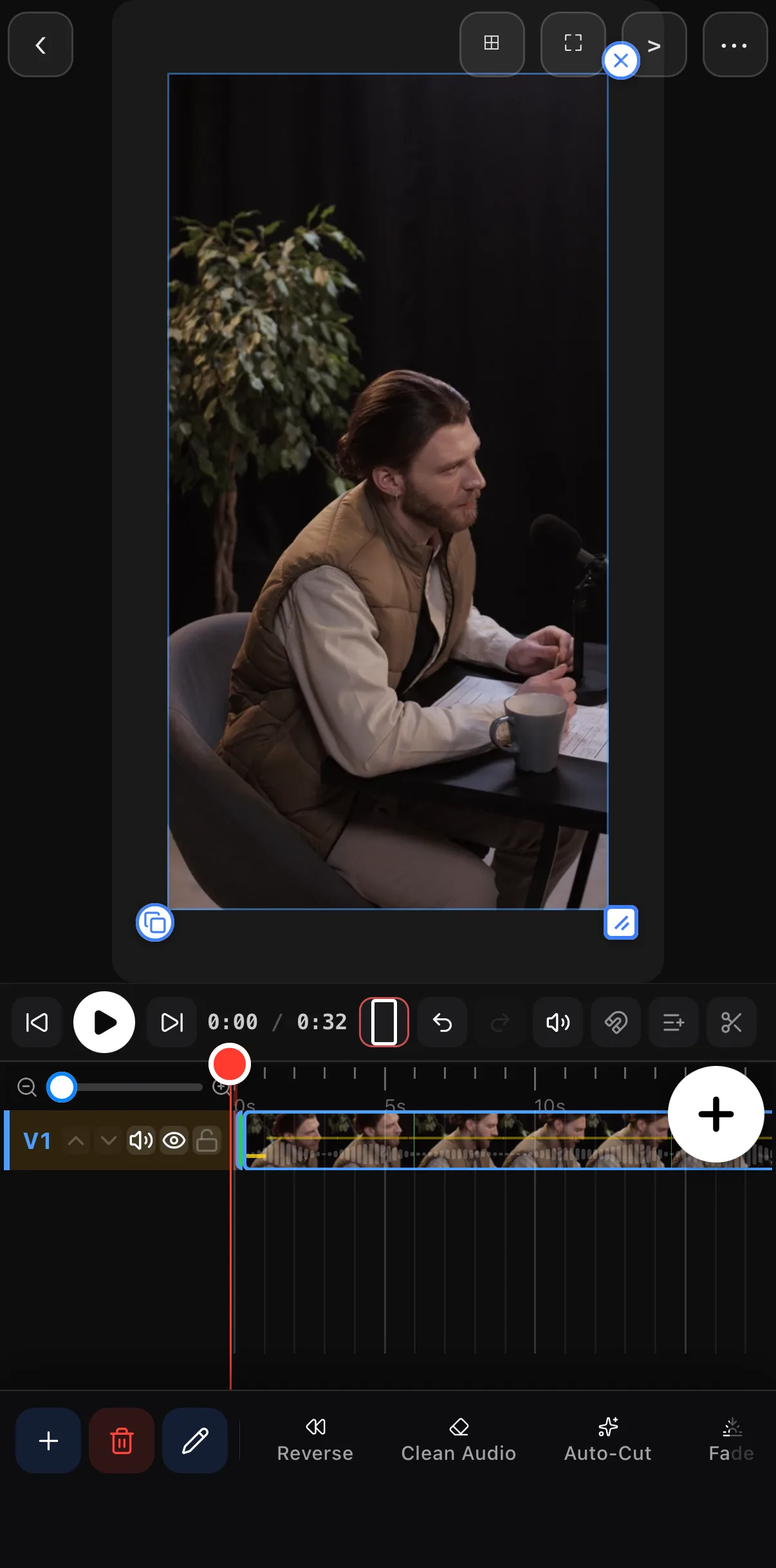The video clip's toolbar scrolled to Reverse, Clean Audio, Auto-Cut and Fade, with the 32-second take selected on V1.
