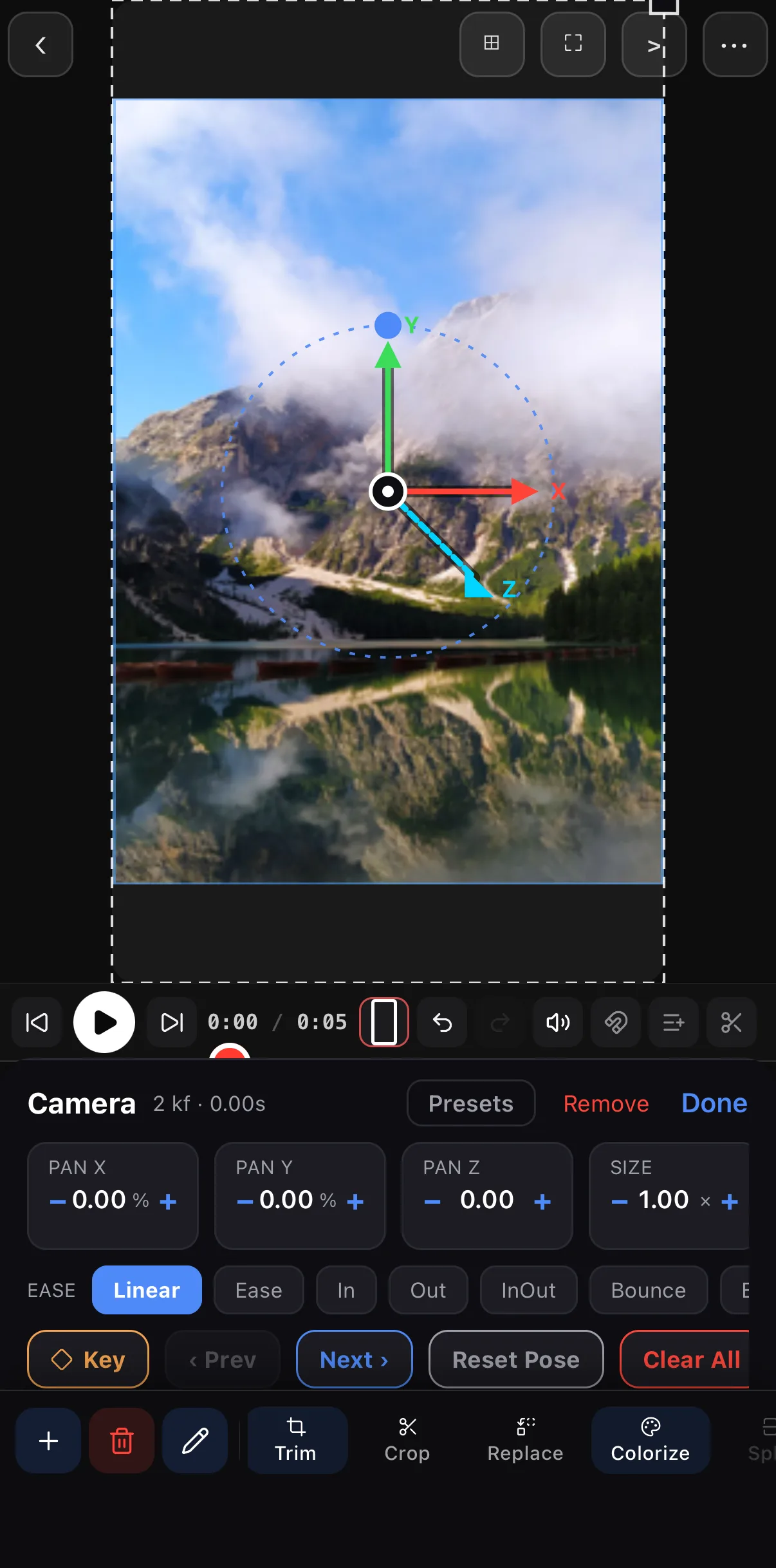 The Camera panel's Controls view: Pan X 0.00 %, Pan Y 0.00 %, Pan Z 0.00 and Size 1.00 × steppers; an Ease row with Linear (selected), Ease, In, Out, InOut, Bounce; and a bottom row with Key, ‹ Prev, Next ›, Reset Pose and Clear All.