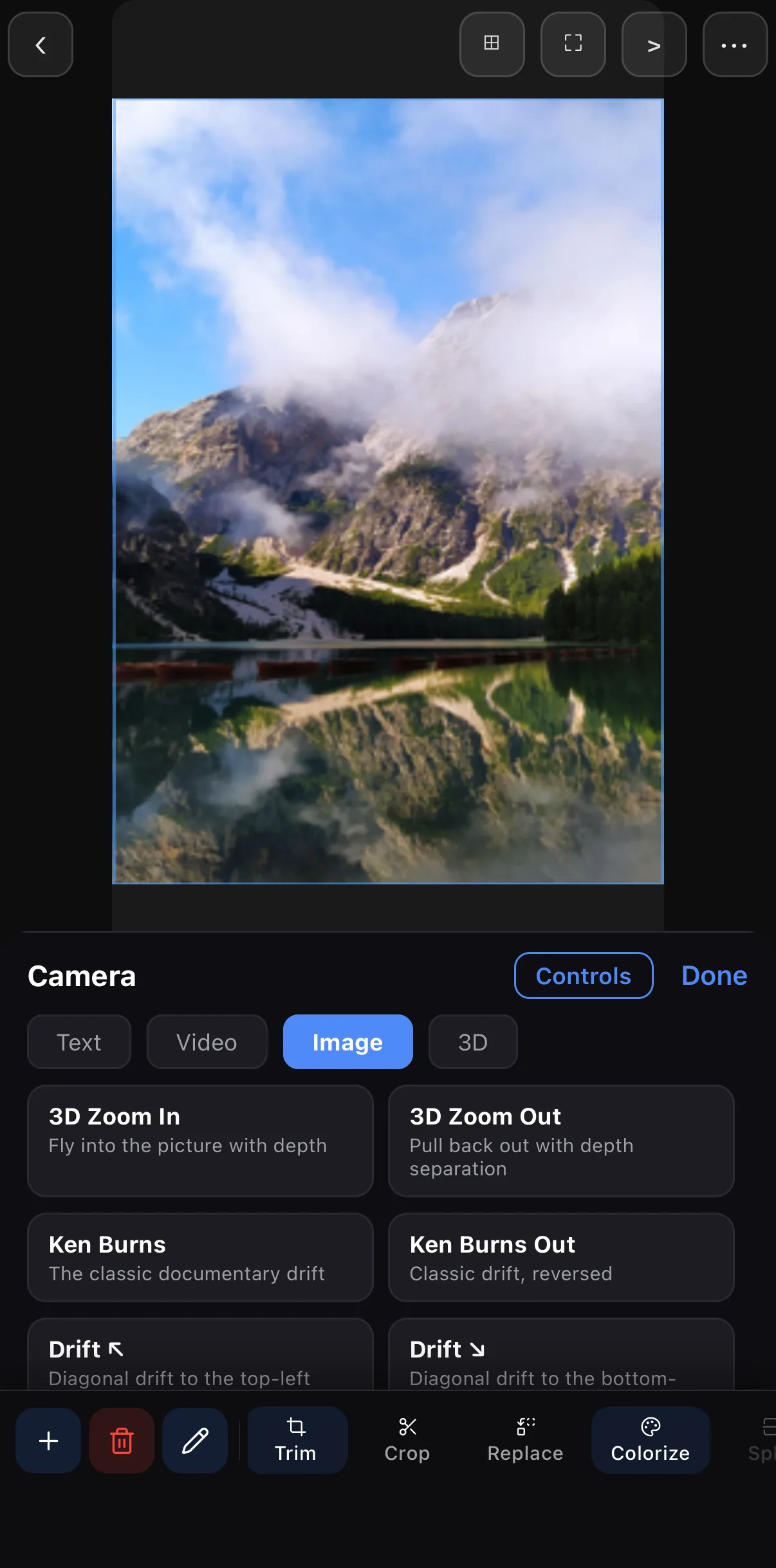 The Camera panel's Presets view over a mountain-lake photo: set chips Text, Video, Image (selected) and 3D, and preset cards 3D Zoom In, 3D Zoom Out, Ken Burns, Ken Burns Out, Drift ↖ and Drift ↘, each with a one-line description.