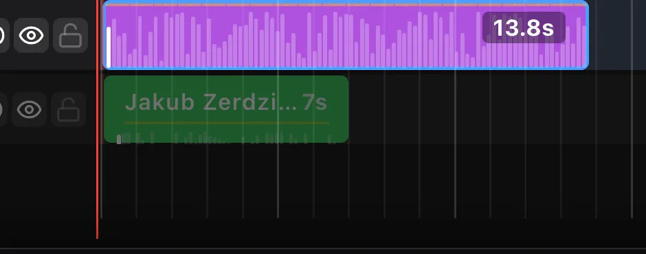 Timeline close-up showing a music clip's waveform with regular peaks above a shorter video clip.