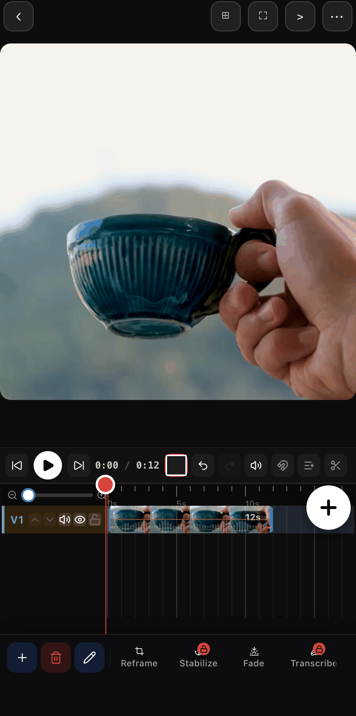The square canvas after Auto Reframe: the blue mug sits in the centre of the frame and the Undo button is active.