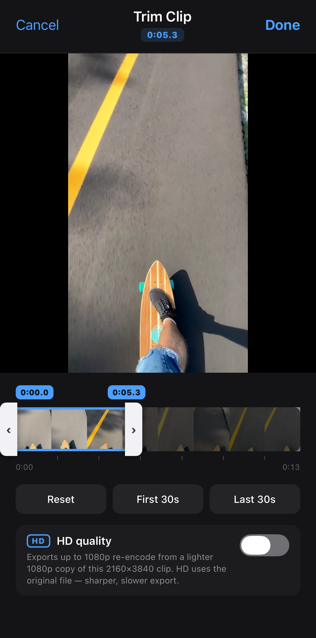 The Trim Clip sheet with a skateboarding clip trimmed from 14 seconds to 5.3 seconds; the filmstrip shows the blue in/out handles and an HD quality toggle below.