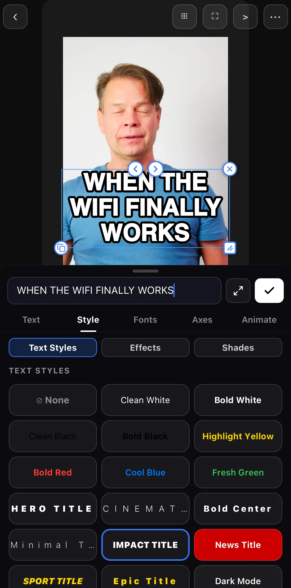 The text tray's Style tab with IMPACT TITLE selected; the canvas shows WHEN THE WIFI FINALLY WORKS in bold white outlined type over a man in a blue T-shirt.