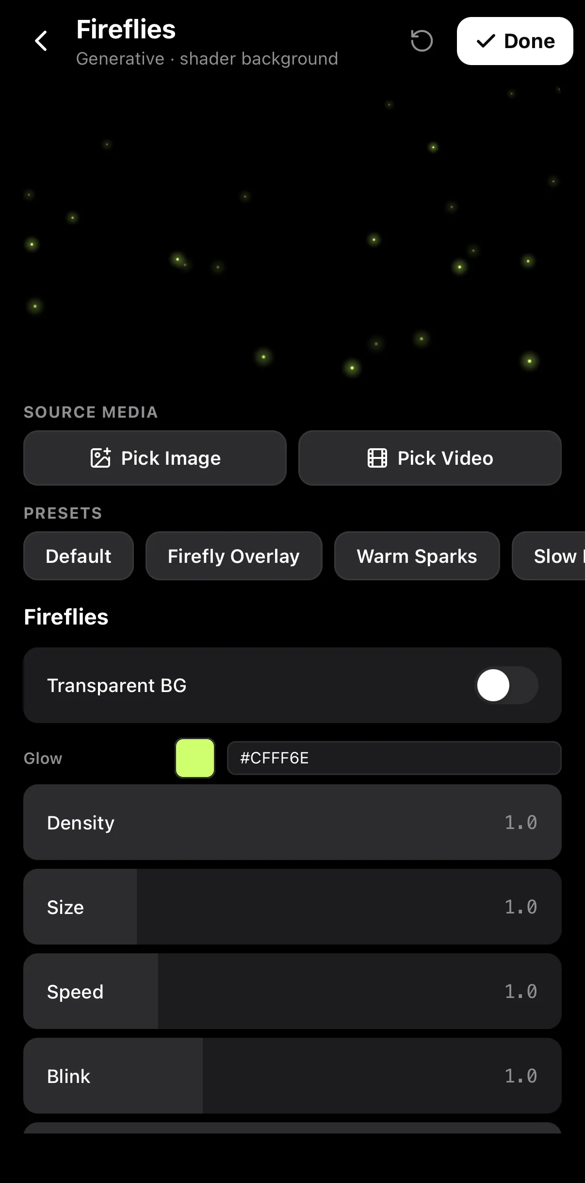 The Fireflies editor: a preview of glowing green points, Source Media buttons, presets Default, Firefly Overlay, Warm Sparks and Slow, a Transparent BG switch, a Glow colour field, and Density, Size, Speed and Blink scrubbers.