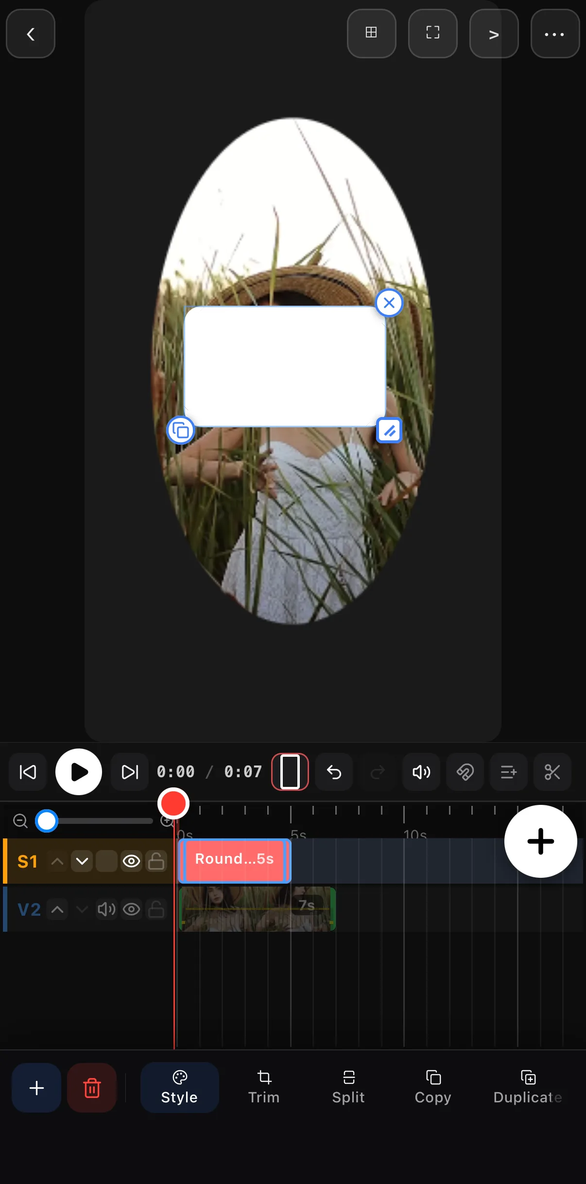 A white rounded rectangle shape on the canvas over the masked clip, on its own S1 row above the video row V2, with the Style, Trim, Split, Copy and Duplicate tools
