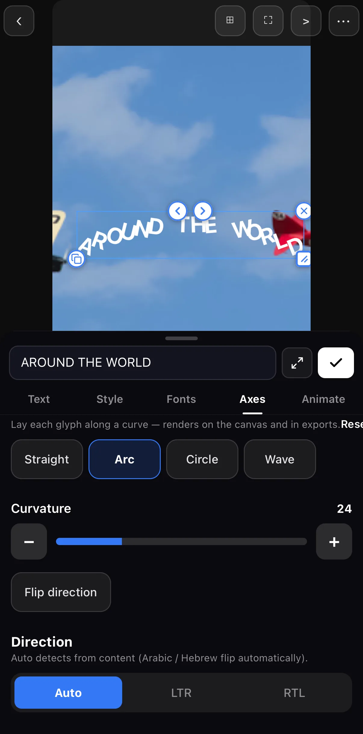 The text tray's Axes tab with AROUND THE WORLD bent into an arc over a blue sky: the Path row shows Straight, Arc (selected), Circle and Wave, a Curvature slider at 24, a Flip direction button, and a Direction row Auto / LTR / RTL.