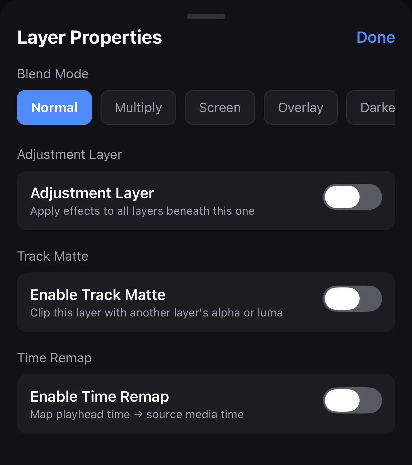 The Layer Properties panel showing a Blend Mode row, an Adjustment Layer toggle, and an Enable Track Matte toggle described as clipping the layer with another layer's alpha or luma